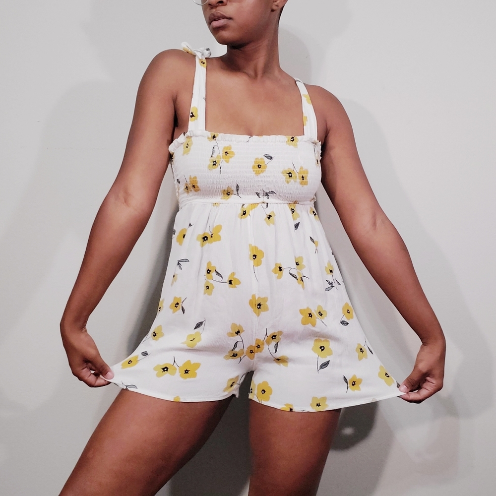 Billabong white romper with yellow floral pattern
